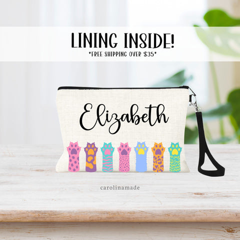 This adorable bag features colorful cat arms / paws. Pinks, orange, teal, blues, yellows. Personalize it with your name on top.
