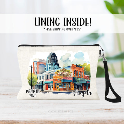 Beautiful watercolor Memphis Tennessee design in the center of the linen wristlet. It is personalized with your name on the right corner. And says Memphis and the year on the left corner.