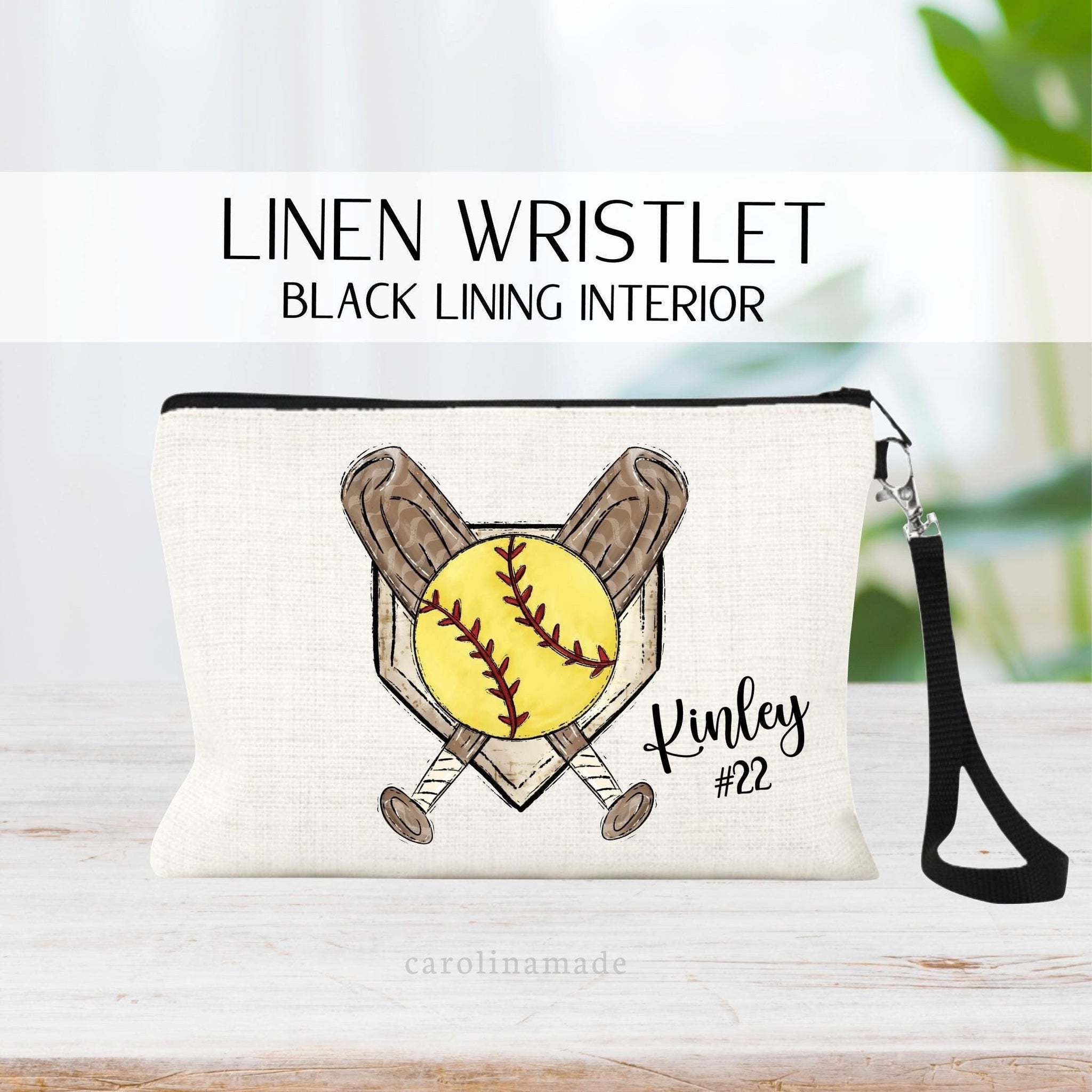 This zipper pouch features a softball, bats and a diamond in the center. It is personalized with your name and jersey number.